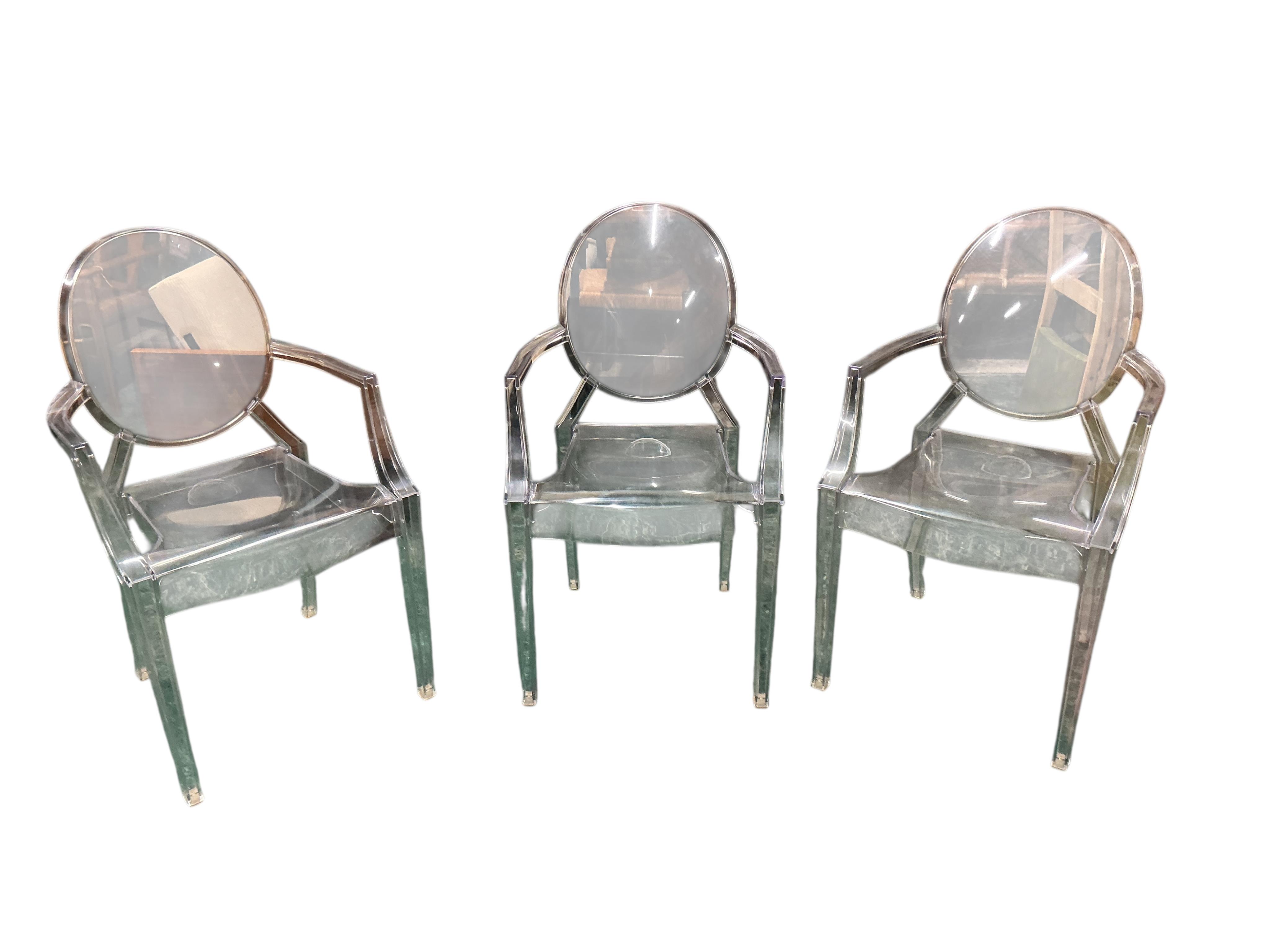 Three Philippe Stark Louis Ghost chairs by Kartell, width 54cm, depth 50cm, height 98cm